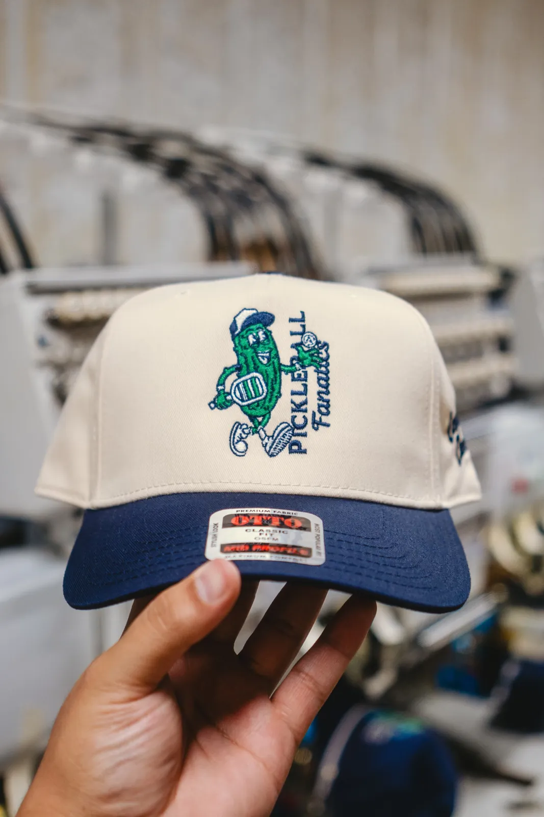 Cream and navy business hat with colorful pickleball embroidery